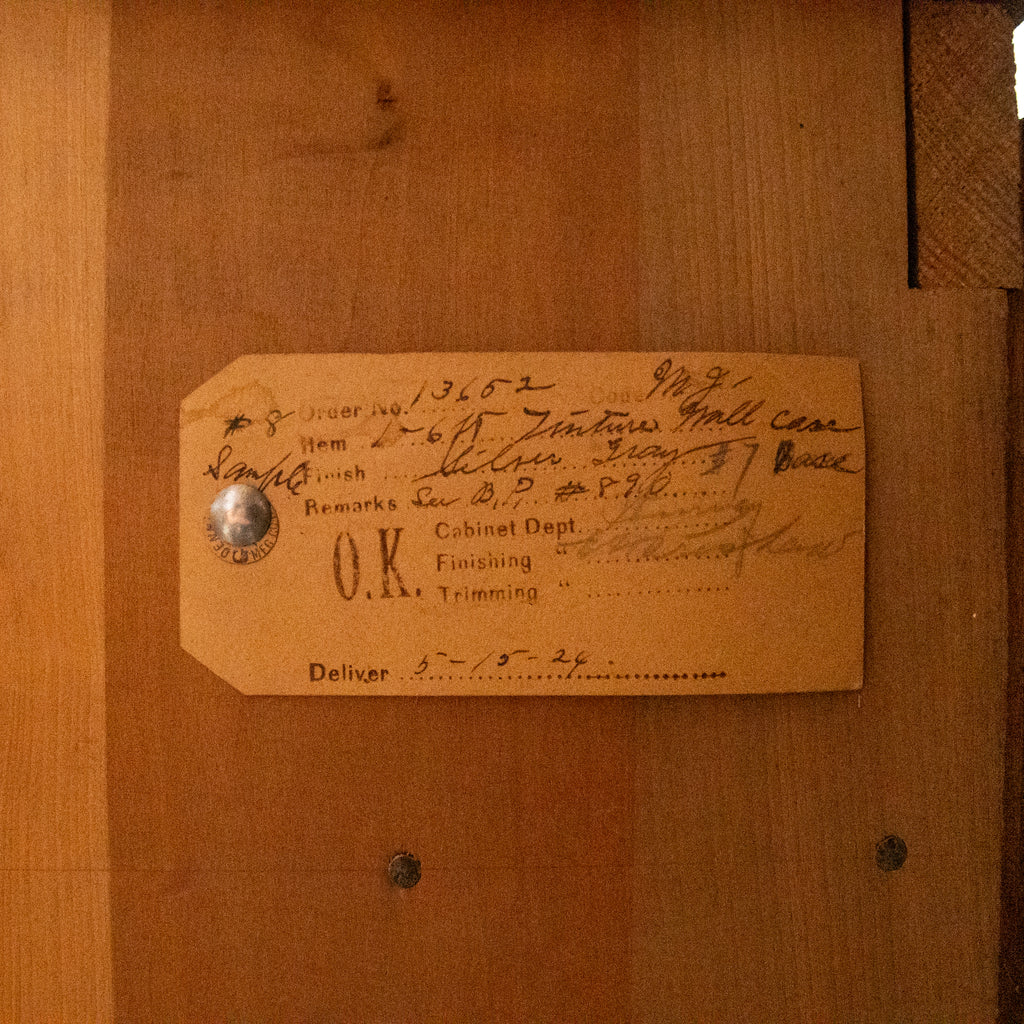 reclaimed apothecary cabinet oak inspection tag view