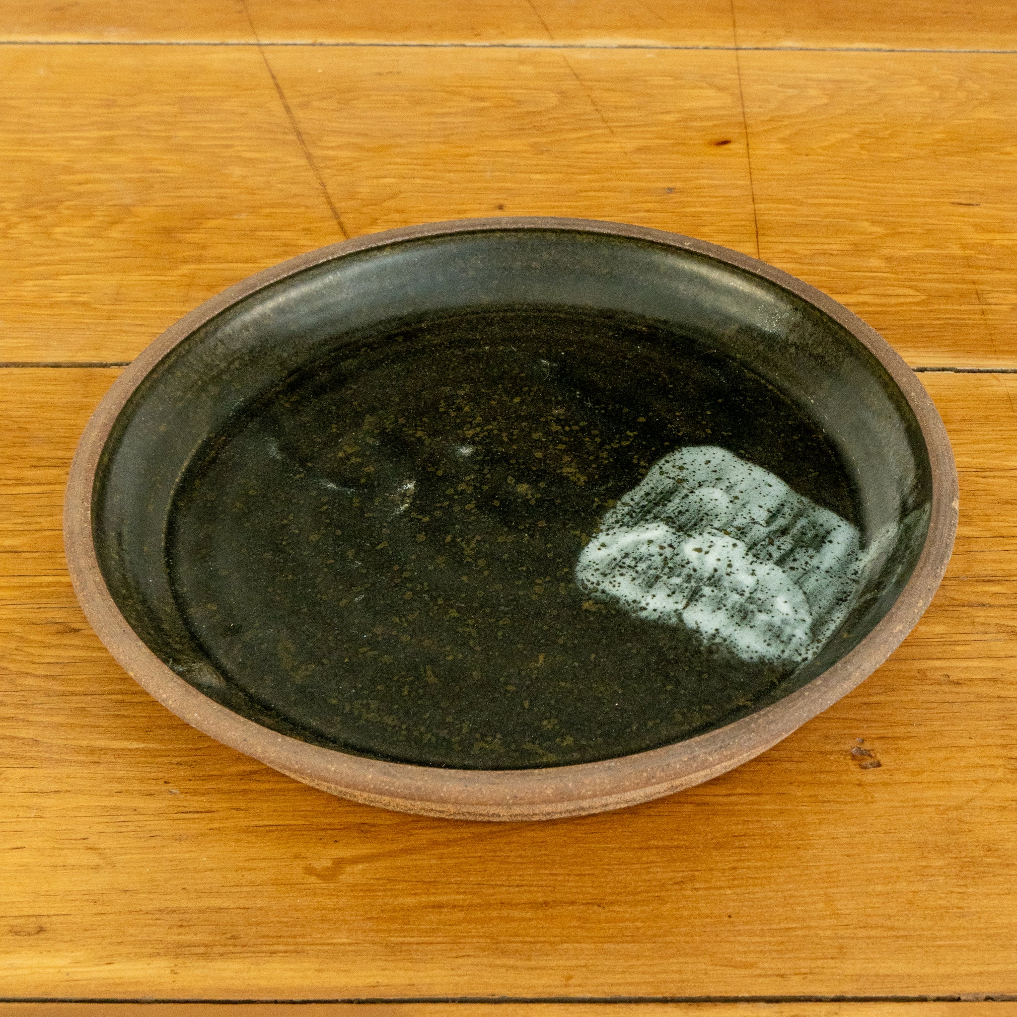 black stoneware plate top view