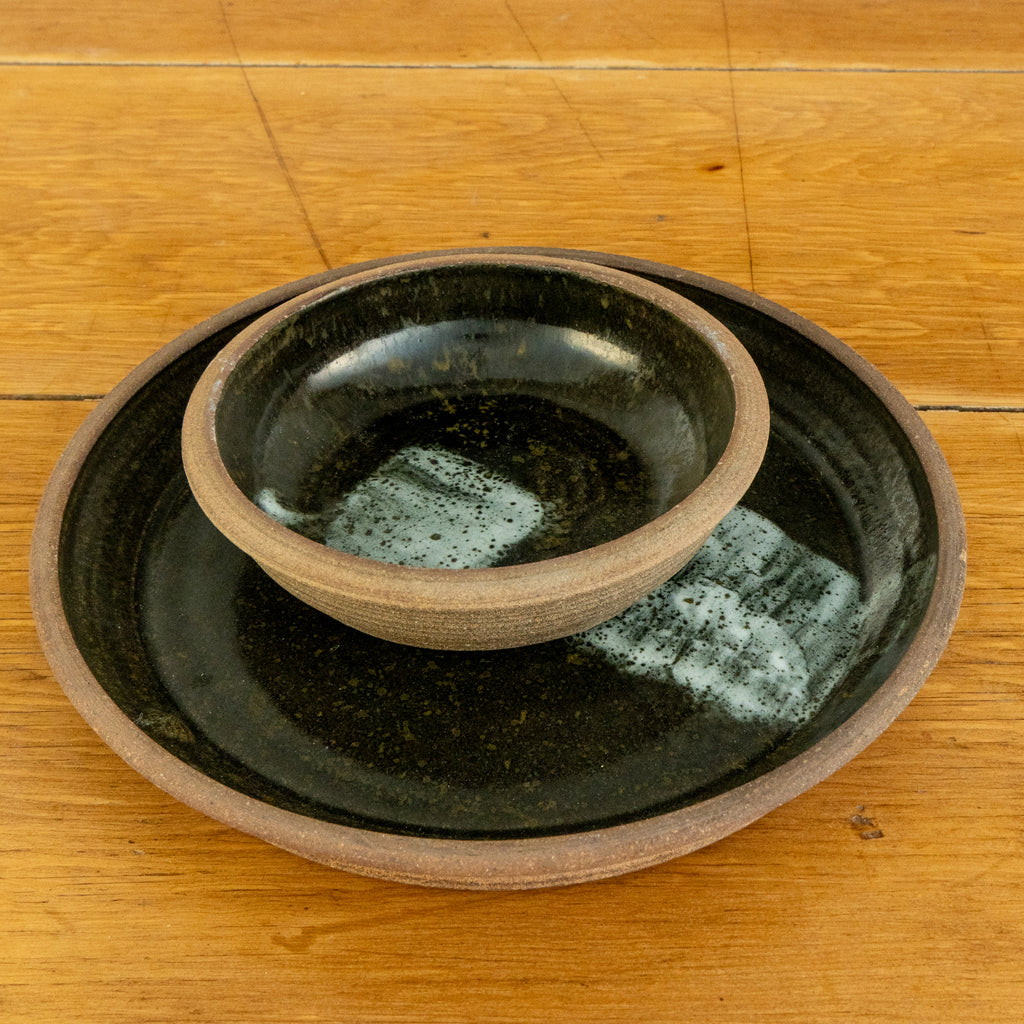black stoneware plate with stoneware bowl 