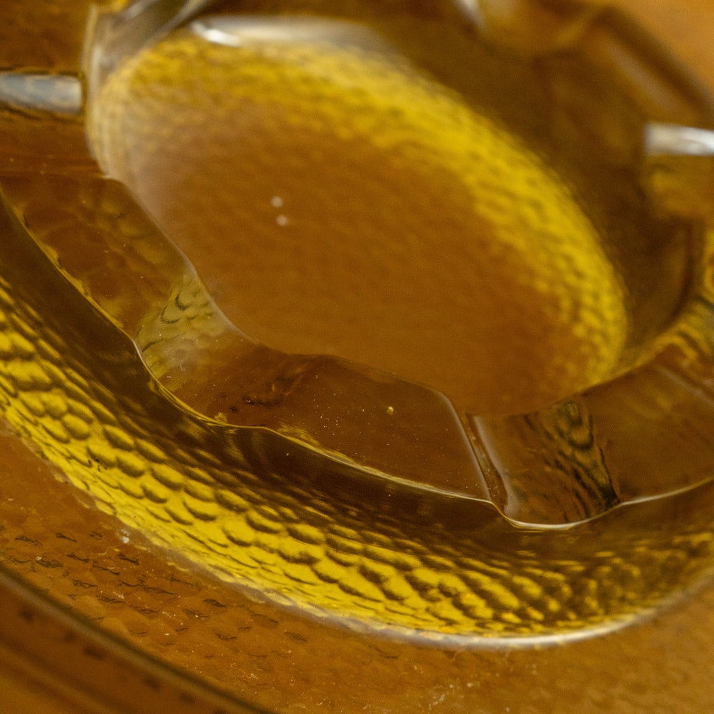 vintage amber glass ashtray detailed view