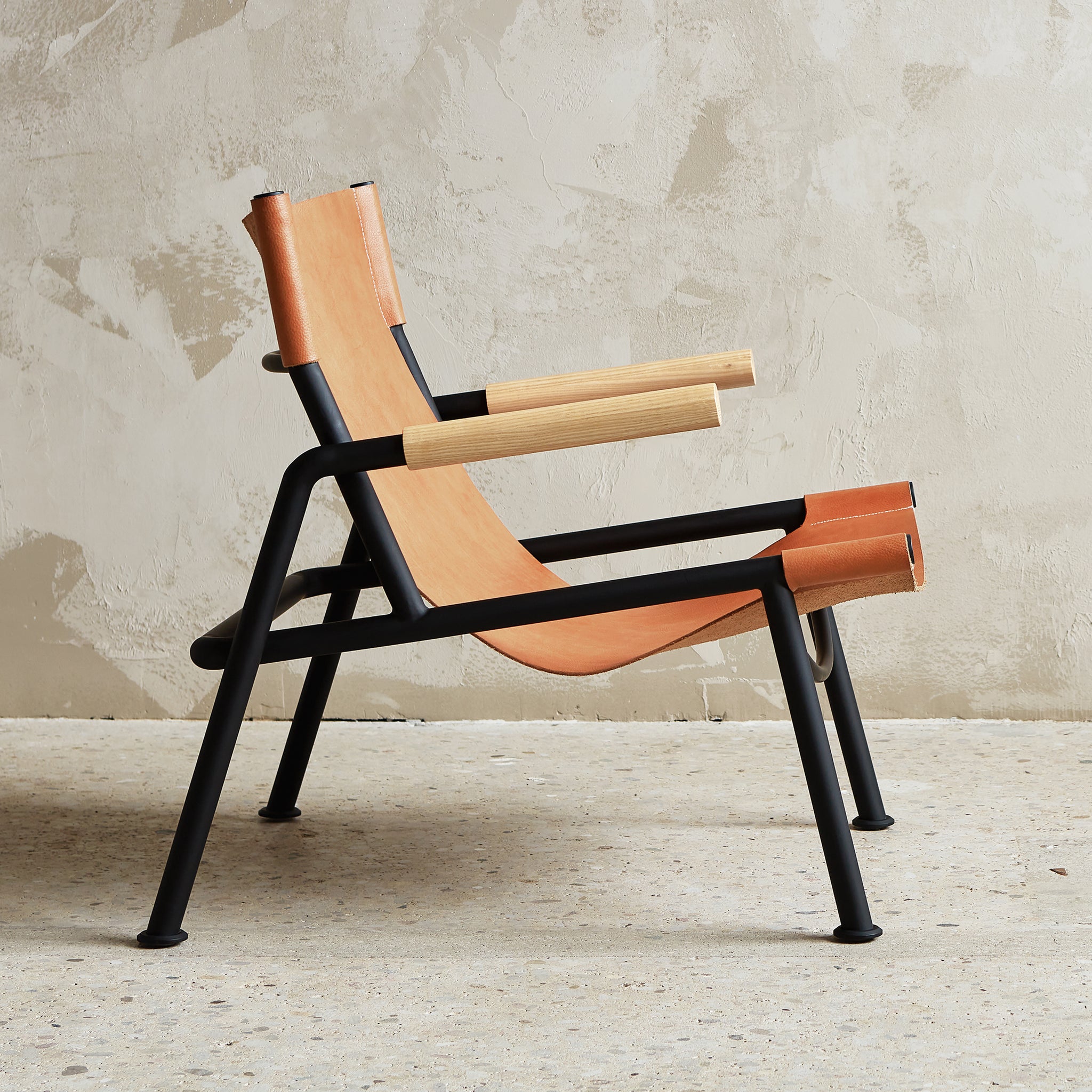 Wyatt sling chair sorrel Havana leather side view