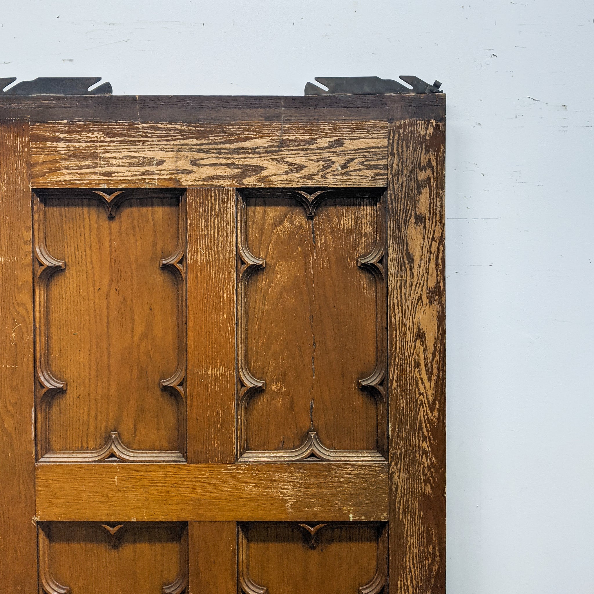 Baroque style quarter folio pocket door close up detail view reclaimed wood antique