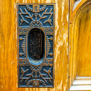 baroque style quarter folio doors close up detail view reclaimed wood antique